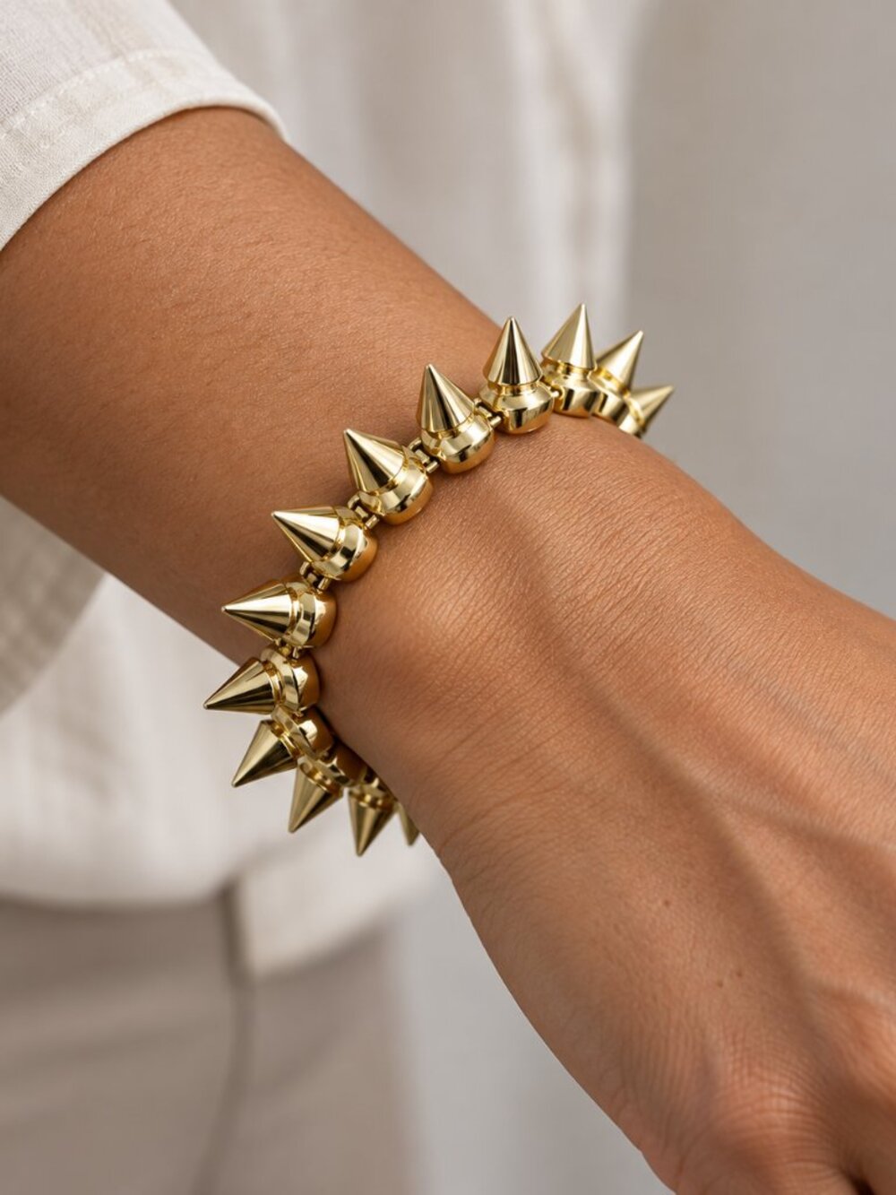 nOir Jewelry Gold Tone Raised Cone Spike Link Bracelet NWT